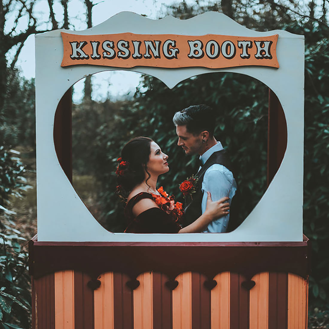 I'm not sure if there's a kissing booth in the film, but there sh...